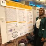Duaa Althumairy with Poster at 2019 Showcase